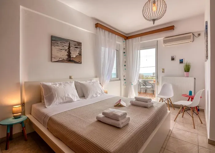 Апартаменты Agiazi Beachfront *